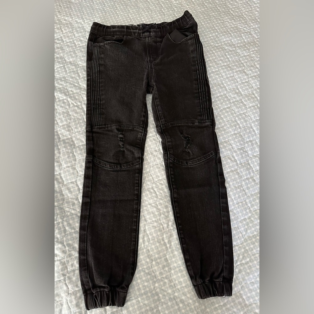 Black boys pants cinched at ankles from Tilly’s brand Eastpointe